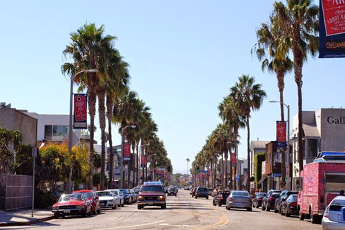 Stroll down Abbot Kinney Boulevard, known for its trendy boutiques, art galleries, and vibrant dining scene, embodying the spirit of Venice, California. Abbot Kinney Boulevard is LA’s trendiest street