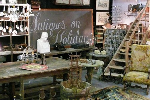 Discover hidden treasures at Antiques on Holiday, a charming store featuring a diverse collection of vintage finds and unique antiques in a delightful setting. Antiques on Holiday