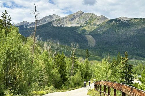 Bike the Blue River Bikeway: A scenic Colorado trail offering picturesque views along the river, perfect for cycling, walking, and enjoying the great outdoors. What to Do in Breckenridge, Colorado Blue River Bikeway Colorado