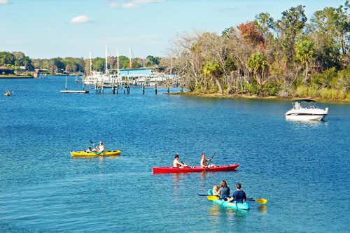 Visit Crystal River, Florida: Known for its clear springs, manatee encounters, kayaking, and snorkeling in a stunning natural setting. Crystal River Florida-min