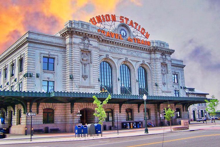 Visit Denver Union Station, a historic landmark and transportation hub, featuring shops, restaurants, and a lively atmosphere in the heart of the city. Denver Union Station-min-min