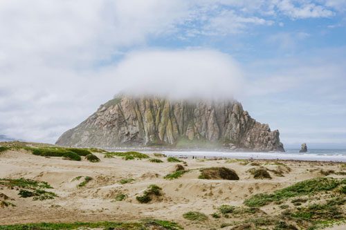 Relax at Dockweiler State Beach in Los Angeles, known for its sandy shores, scenic ocean views, and designated fire pits perfect for beach bonfires. Dockweiler State Beach-min