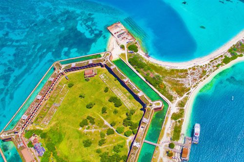 Discover Dry Tortugas National Park: A remote Florida gem with crystal-clear waters, historic Fort Jefferson, snorkeling, and abundant marine life. Ultimate locations to explore in Florida Dry Tortugas National Park