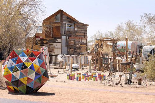 Visit East Jesus in Slab City, California, an offbeat outdoor art installation showcasing eclectic sculptures and creative, recycled artwork. East Jesus is an eclectic, off-the-grid art installation in the desert near Salvation Mountain