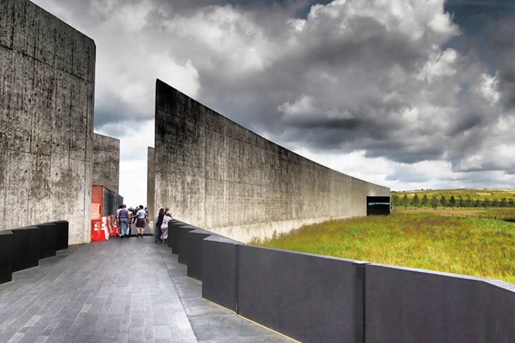 A poignant view of Flight 93 National Memorial, featuring a serene landscape with a reflective wall and peaceful surroundings, honoring the bravery. Best Things to Do in Pennsylvania