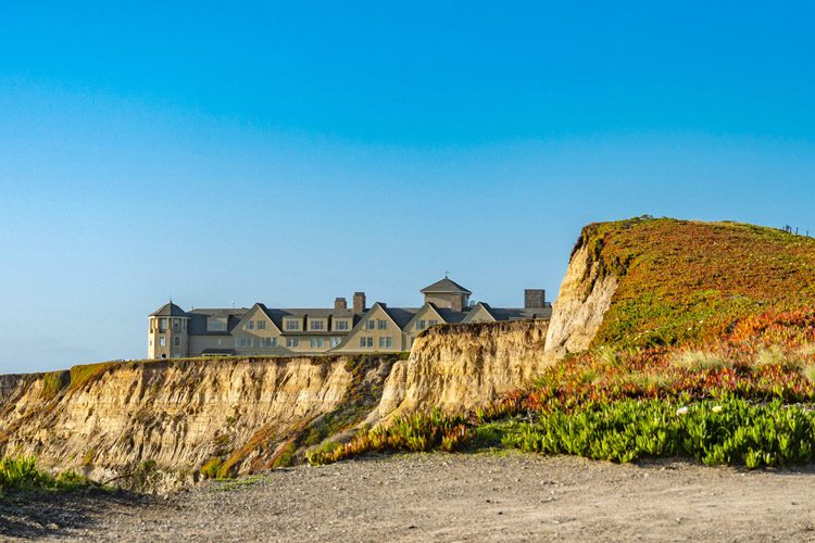 Half Moon Bay offers stunning coastal views, beautiful beaches, and vibrant flower fields, perfect for a scenic getaway. Half Moon Bay is a charming coastal town