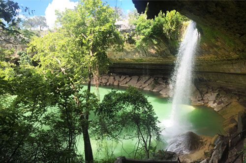 Hamilton Pool Preserve: A scenic Texas gem with a natural pool, waterfall, and stunning limestone formations. Perfect for swimming and hiking. Hamilton Pool Preserve-min