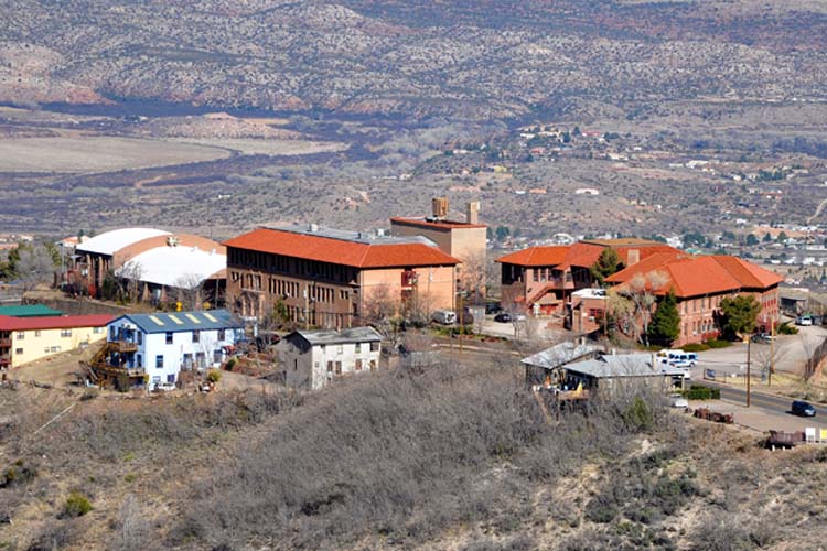 Jerome, Arizona: a former mining town turned artsy retreat, perched on Cleopatra Hill with panoramic views and a rich Old West history. Arizona's must-see places for travelers erome is a historic mining town turned artistic community