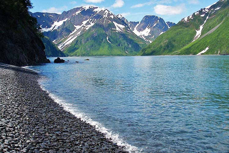 Discover Kenai Fjords National Park: A stunning Alaskan wilderness with massive glaciers, rugged fjords, and abundant marine wildlife. Kenai Fjords National Park Alaska’s top places to discover