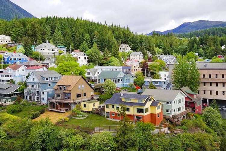 Visit Ketchikan, Alaska: A charming waterfront town known for its vibrant totem pole collection, rich fishing culture, and stunning natural beauty. Ketchikan, known as the “Salmon Capital of the World Essential spots to see in Alaska