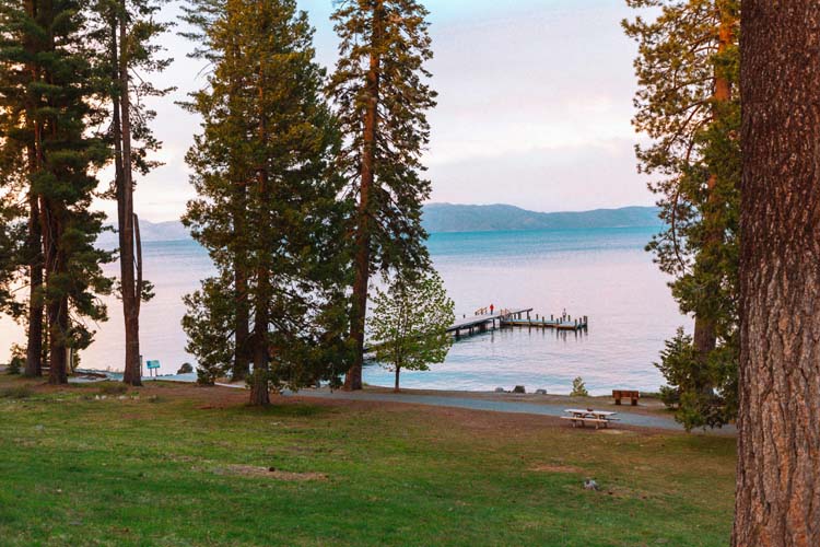 Explore Lake Tahoe, a stunning alpine lake offering year-round outdoor activities, from skiing in winter to hiking and boating in summer. stunning shores of Lake Tahoe