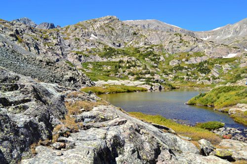 Discover McCullough Gulch: A picturesque Colorado trail featuring waterfalls, alpine lakes, and stunning mountain scenery, ideal for hikers and photographers. Must-Do Experiences in Breckenridge, Colorado McCullough Gulch