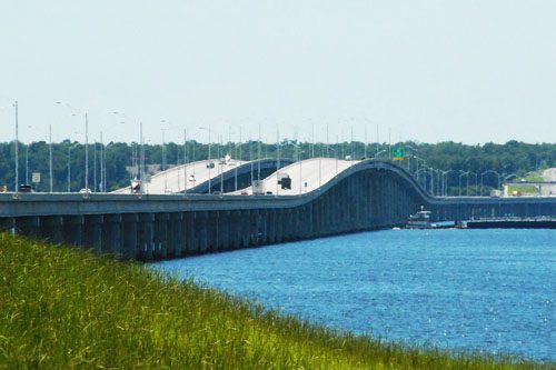 Cross the stunning Mid-Bay Bridge in Destin, Florida, offering breathtaking views of the bay and a scenic route to the beautiful Emerald Coast. Mid-Bay Bridge florida