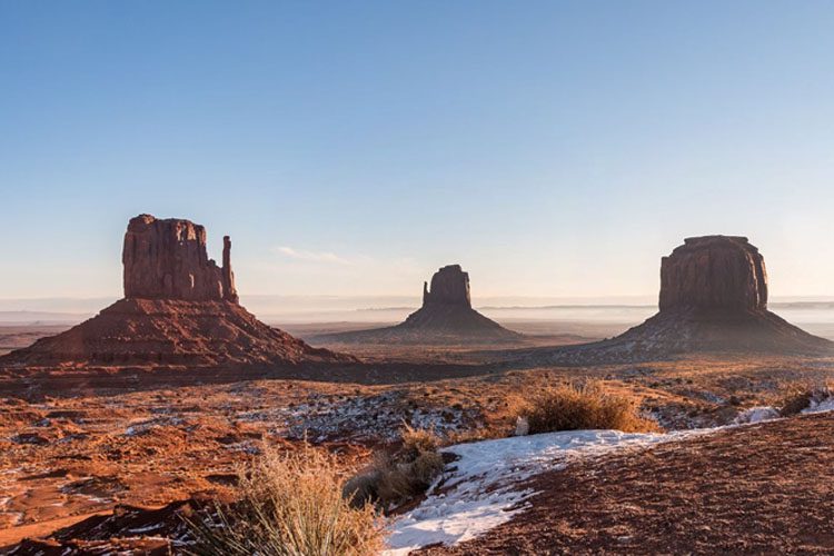 Explore Monument Valley, renowned for its iconic red sandstone formations and breathtaking desert landscapes, offering a stunning backdrop for photography. Best places to visit in Arizona towering sandstone buttes of Monument Valley