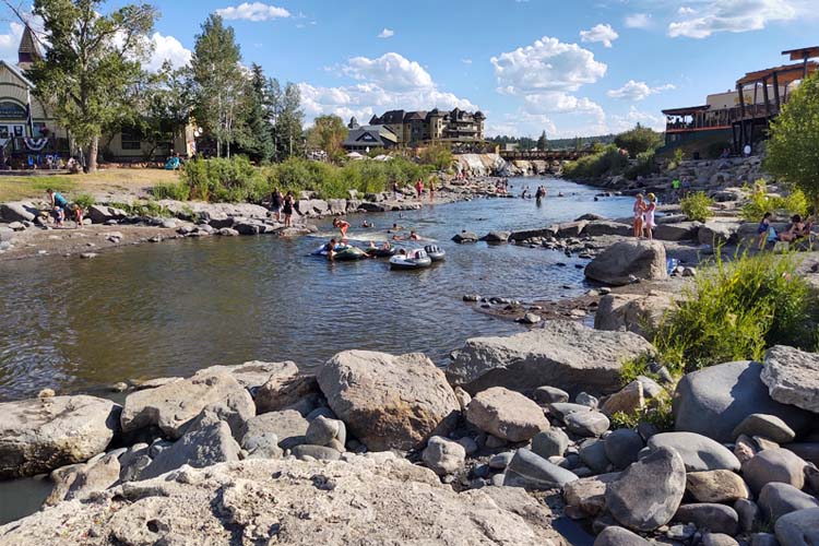 Experience Pagosa Springs, Colorado, famous for its hot springs, stunning mountain views, and a vibrant outdoor lifestyle year-round. Colorado's best travel destinations Pagosa Springs-min-min