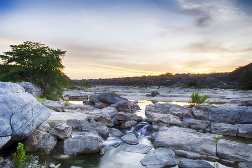 Pedernales Falls State Park features stunning waterfalls and scenic views, perfect for hiking, swimming, and enjoying nature in Texas Hill Country. Pedernales Falls State Park-min