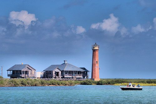 Port Aransas, Texas, is a charming beach town known for its beautiful sandy shores, excellent fishing, and vibrant wildlife. Perfect for a coastal getaway! Port Aransas-min