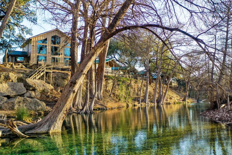 Experience tranquility at River Bluff Cabins in Texas, offering cozy accommodations surrounded by nature, perfect for a relaxing getaway or adventure. Texas Adventures for Families with Kids River Bluff Cabins Texas-min