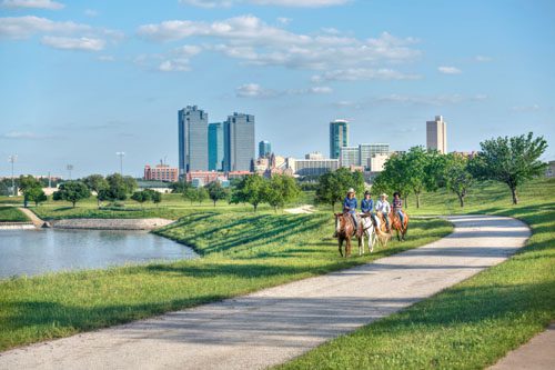 Trinity Park in Texas features lush greenery, walking trails, and serene waters, perfect for picnics and outdoor activities near Fort Worth. Trinity Park has it all on the Trinity River in Fort Worth