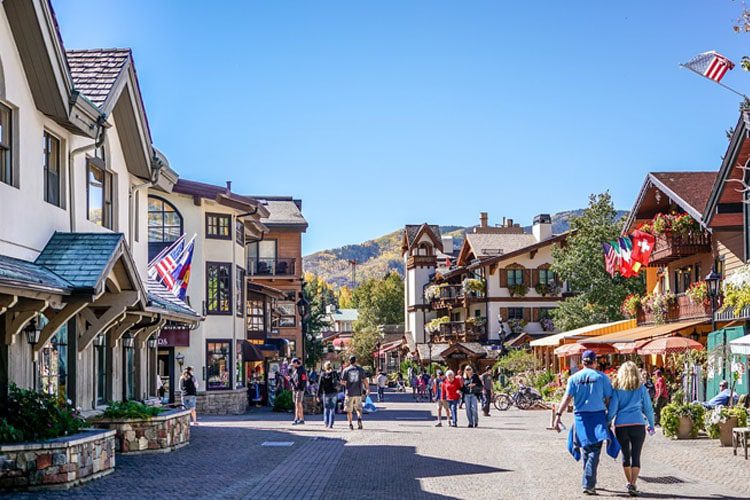 Explore Vail, Colorado, a premier ski resort town known for it breathtaking mountain views, vibrant village atmosphere, and world-class skiing and snowboarding.Must-visit spots in Colorado Vail-min-min