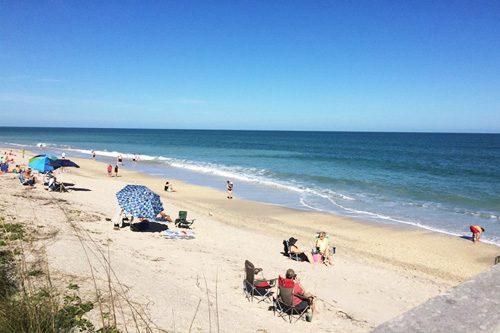 Relax at Vero Beach: A charming Florida coastal town known for its sandy beaches, arts scene, and tranquil nature preserves. Vero Beach-min